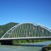 Die gro&szlig;e Bogenbr&uuml;cke &uuml;ber die Etsch bei Pfatten, die der Radweg nach Trient &uuml;berquert. Foto: AT, &copy; Peer